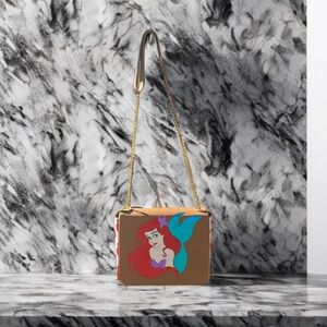 Brown and Red Crossbody Bag with Modern Design